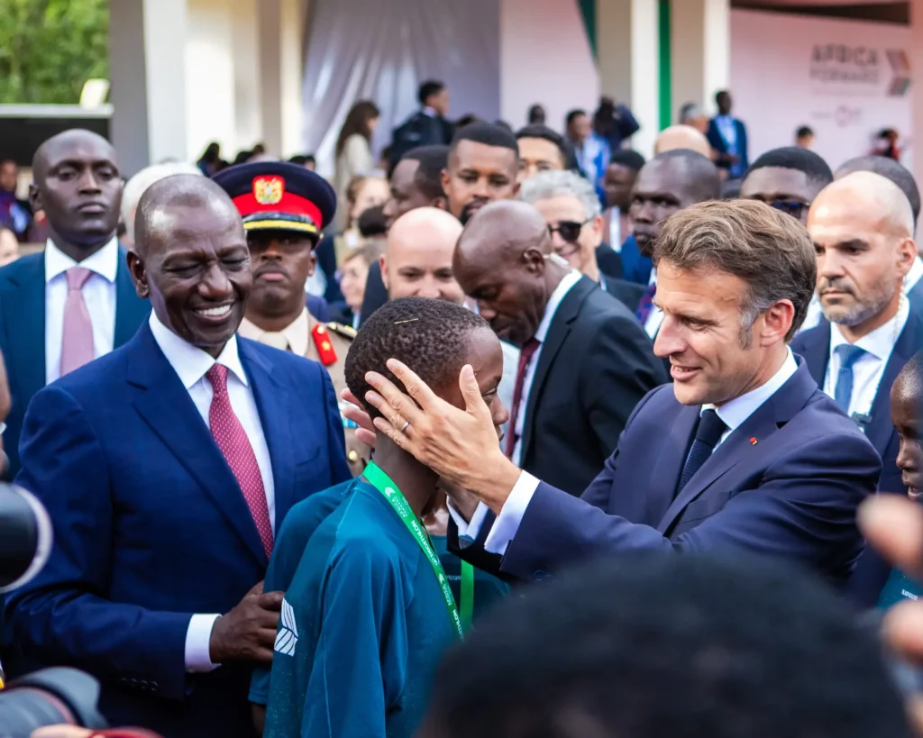 Admedia powers Africa Forward Summit Sports Showcase at UoN 17 French President Emmanuel Macron giving awards to winners during the Africa Forward Summit held in Nairobi Kenya